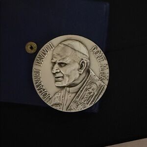 Commemorative Coin with Religious Figure